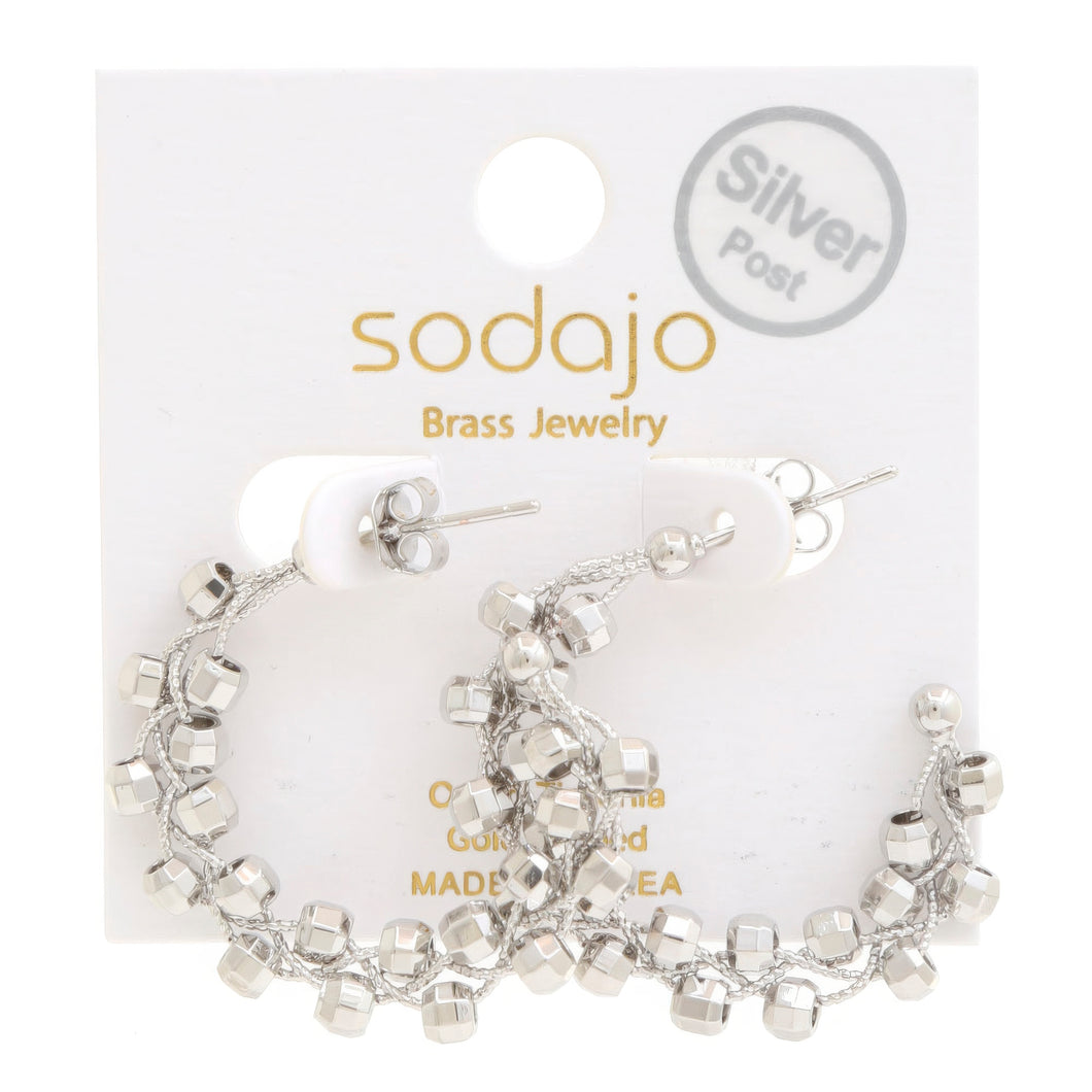 Boucle d'oreille créole ouverte en perles Sodajo trempée en or